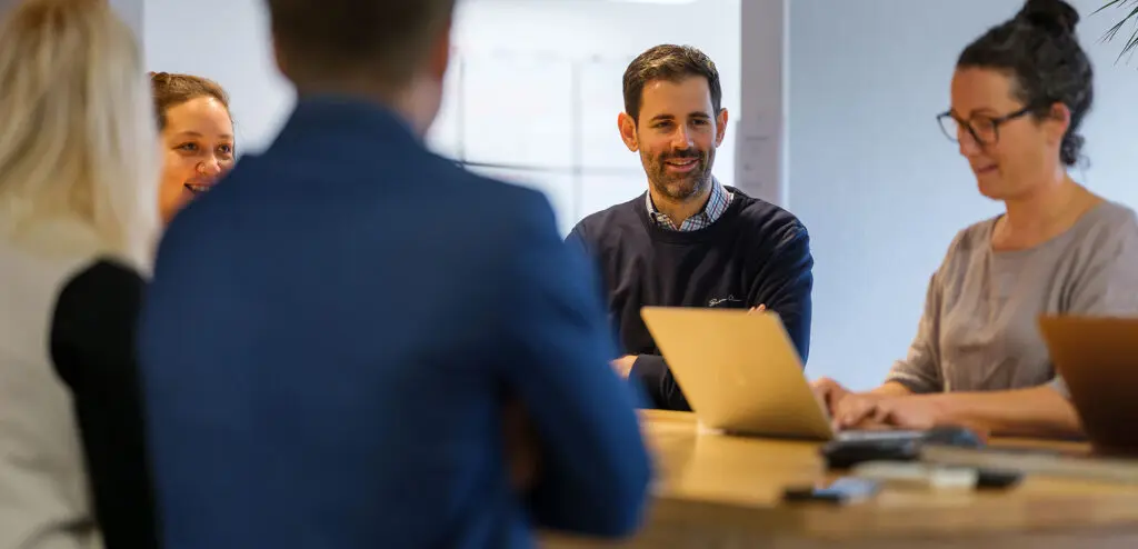 Professional Property Manager working in office having a meeting